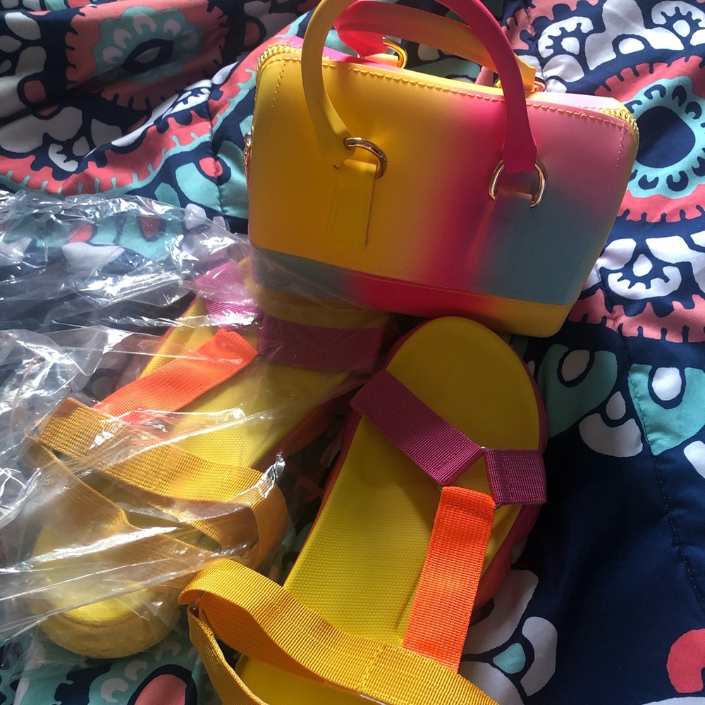 I’m selling a brand new pair of sandals and Bag